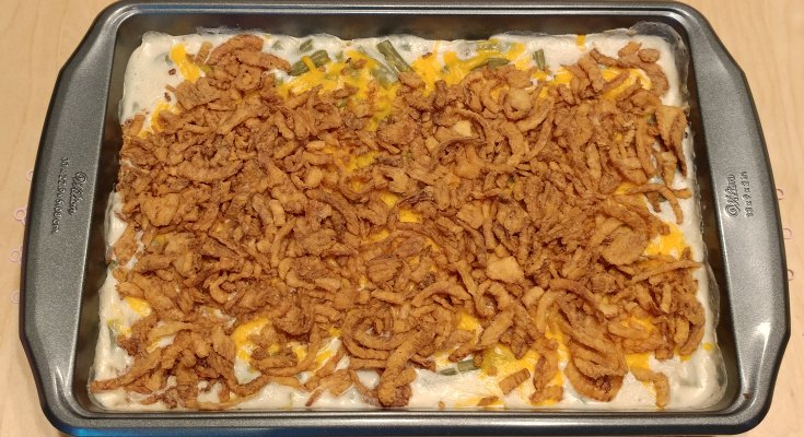 This cheesy version of green bean casserole might sound strange, but your family will love this new take on an old favorite!