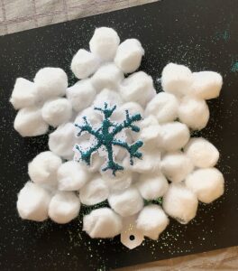 Make this simple and fun DIY snowflake ornament with your child. Makes a great Christmas or Holiday Craft or gift!