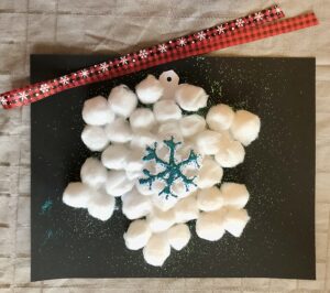 Make this simple and fun DIY snowflake ornament with your child. Makes a great Christmas or Holiday Craft or gift!