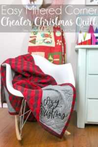 quilt on a chair near a dresser