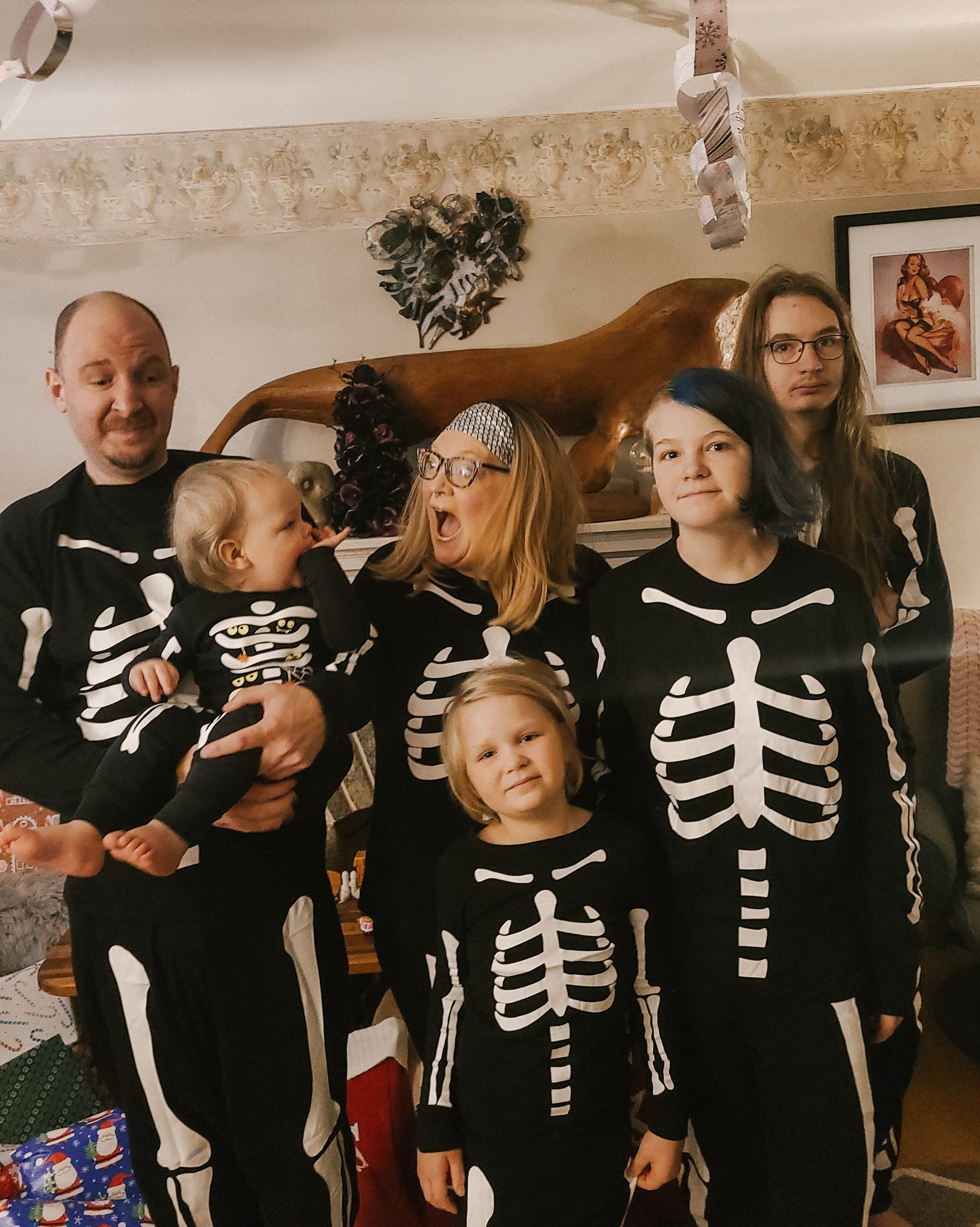 family in skeleton jammies