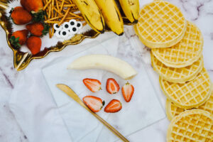 banana, waffles, strawberry, and kitchen knife