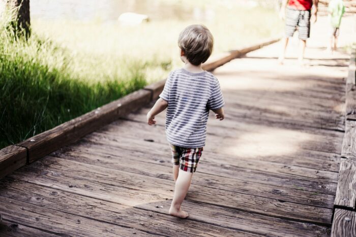 toddler running barefoot