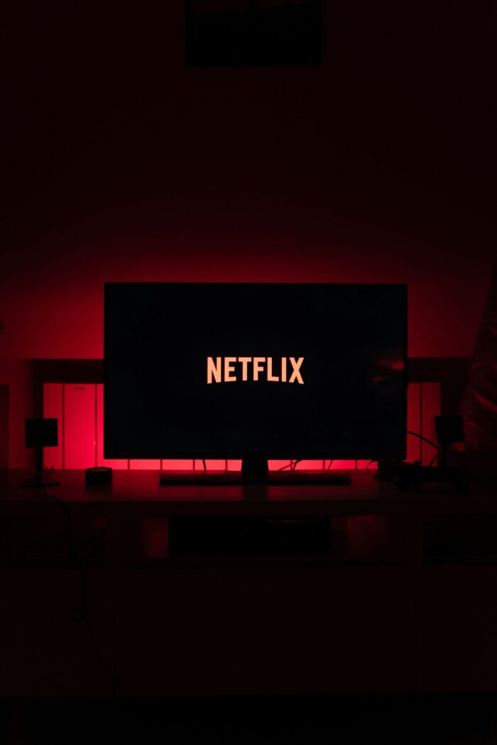 tv in a dark room with NETFLIX