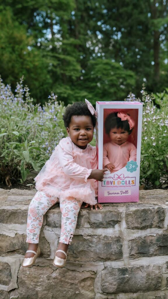 Tavi Dolls baby doll and a little girl